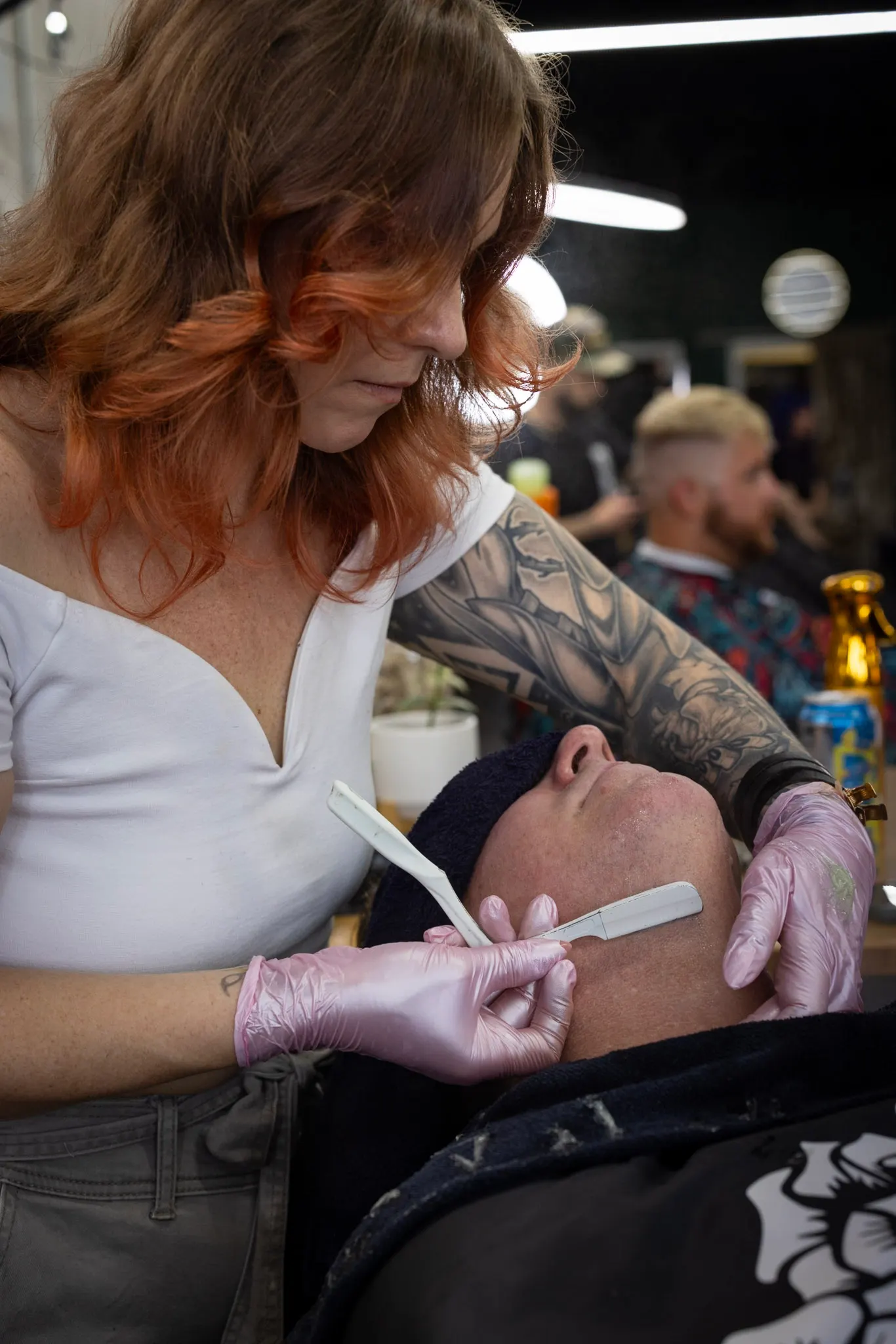 Straight razor shave with a hot towel
