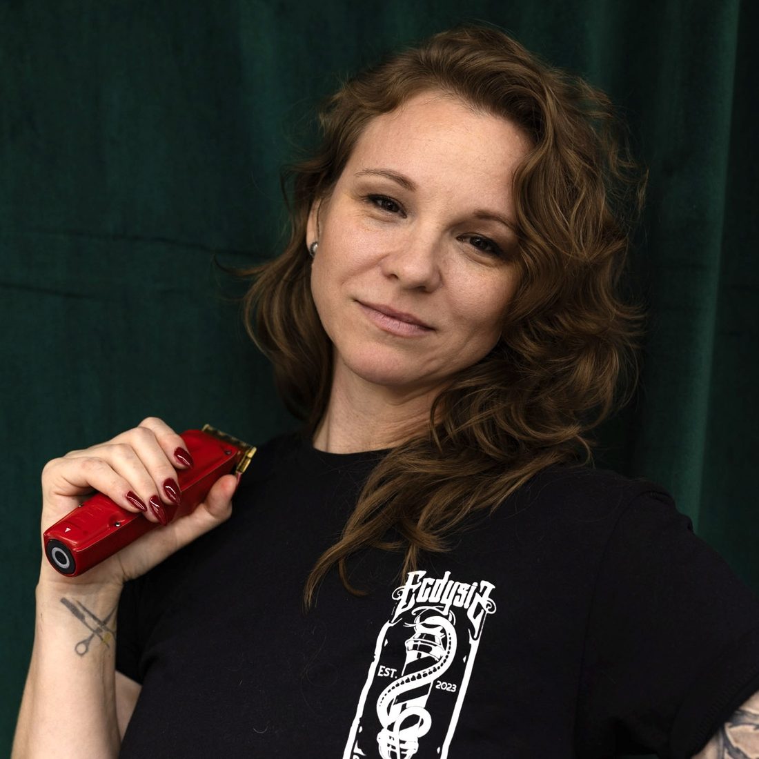 Courtney Layne, Master Barber at Ecdysis Barbershop in Tulsa